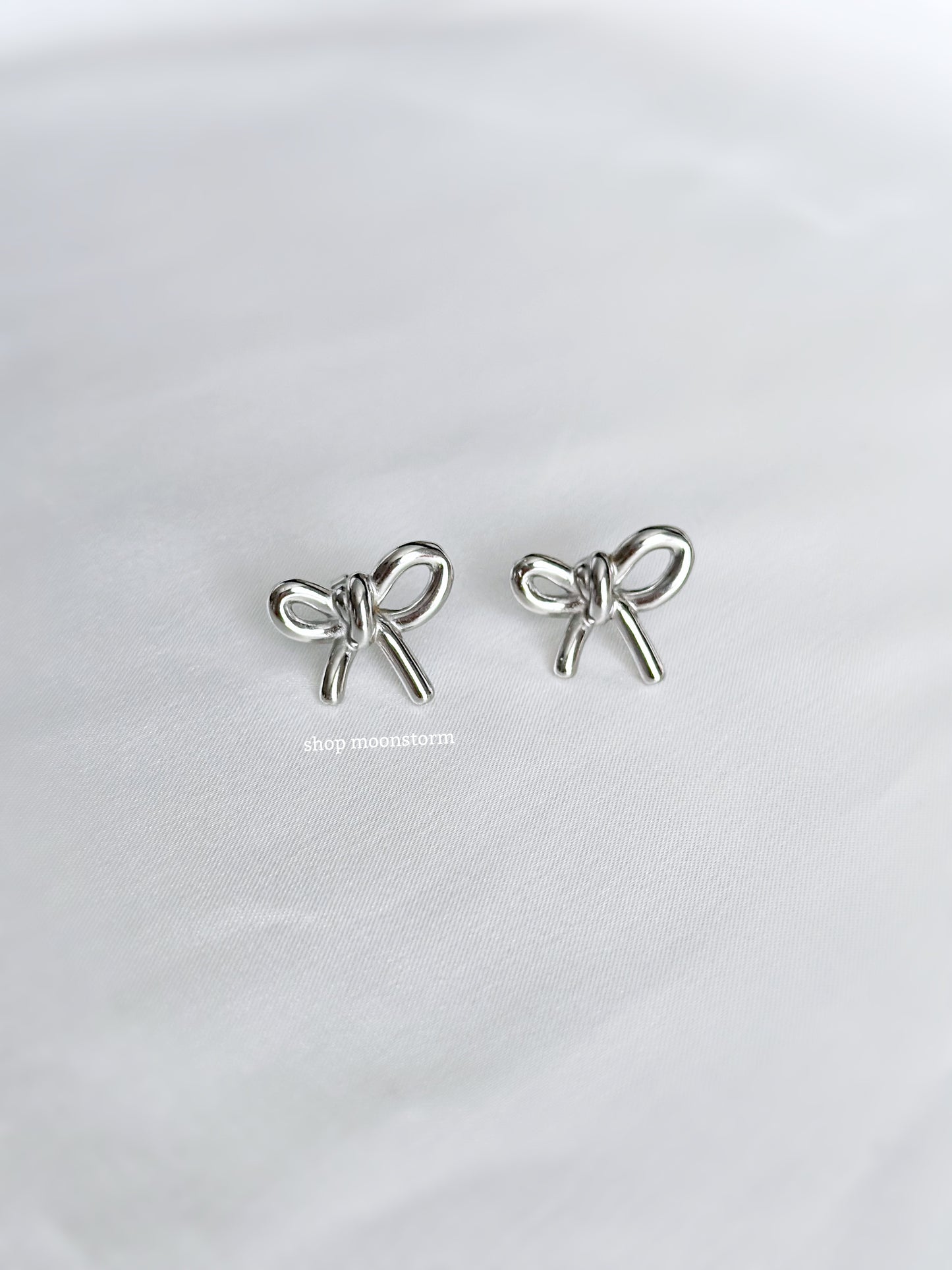 Silver Statement Ribbon Bow Earrings
