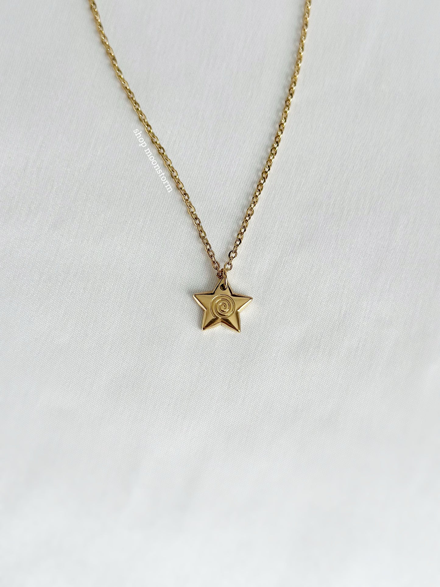 Gold Star Swirl Necklace